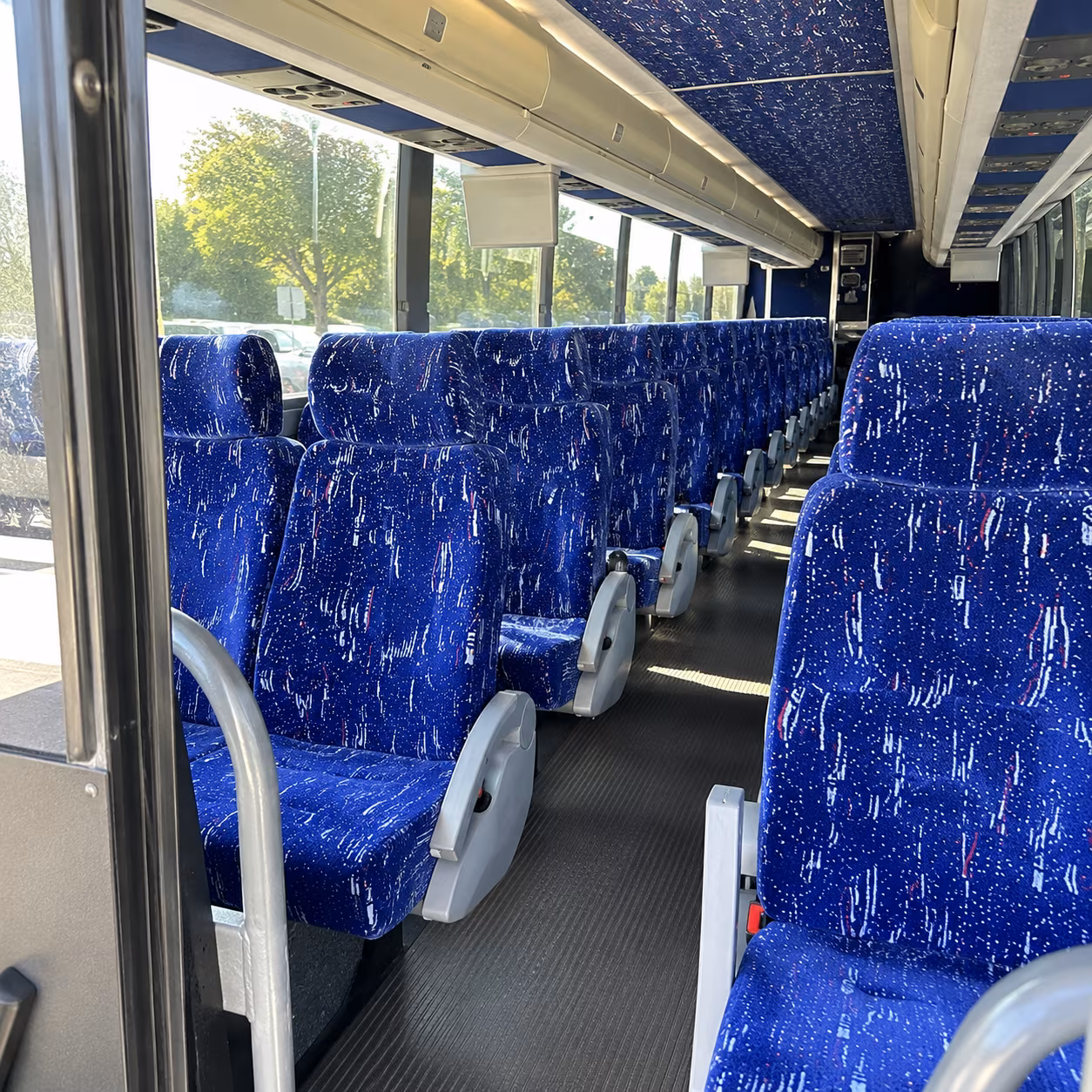 sunrise 50 passenger charter bus inside
